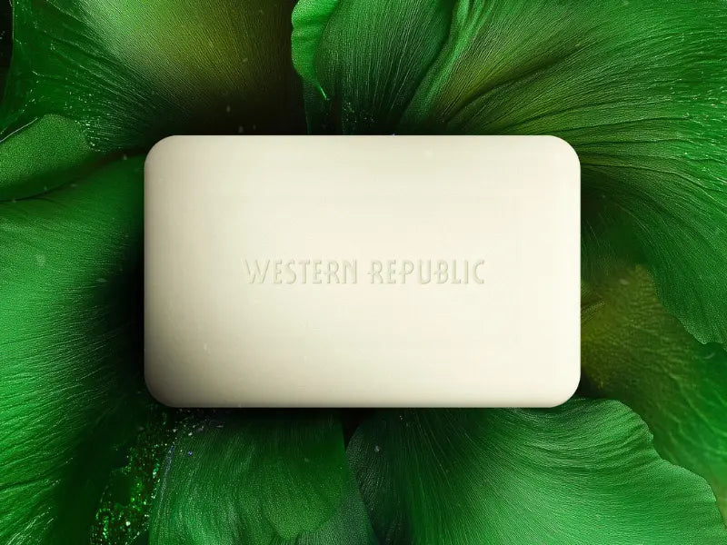 Sensitive skin routine for men featuring a minimalist Western Republic soap bar on a lush green background.
